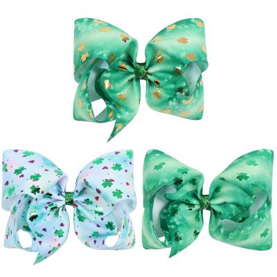 China 7 Inch Large St Patrick's Day Shamrock Glitter Centerpiece Printed Hair Bow For Girls for sale