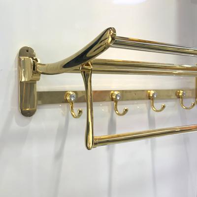 China Zhejiang Factory Modern Bathroom Hardware Luxury Golden Movable Folding Towel Rack for sale