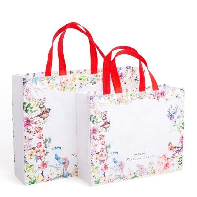 China Reusable Customize Cheap Price Style Ultrasonic Non Woven Packaging Shopping Bag For Promotion Or Gift Apparel Stores Or Cosmetics Packaging for sale