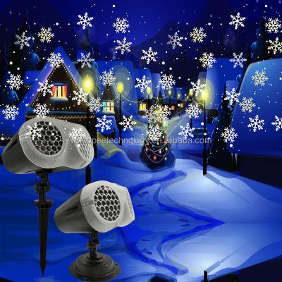 China Christmas Rise Snowflake Snow Storm Background Wide Angle Projection Lamp For Winter Christmas Decoration for sale