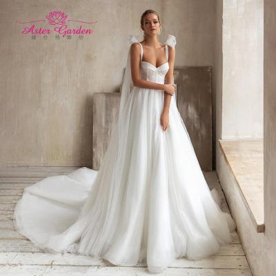 China Dry Cleaning Aster Garden Sweetheart Beaded Spaghetti Straps Wedding Dress 2021 A Line Bow Backless Bride Dresses Lace Up Beach Wedding Dress for sale