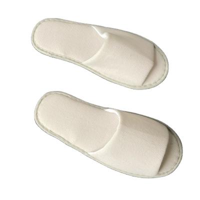 China Personalized Wholesale Disposable Real Beauty Disposable Cloth Open Toe Hotel Slippers for sale