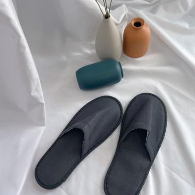 China Fashion Trend Hotel Slippers Gray Disposable Pull Plush Slippers for sale