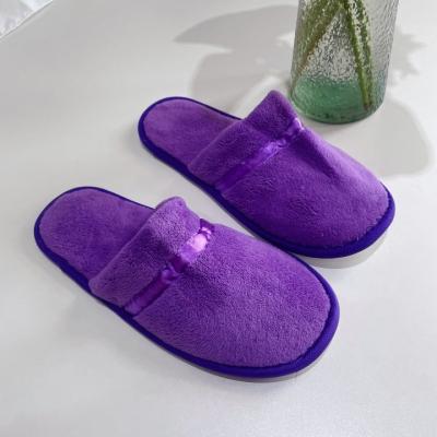 China Custom Lightweight Disposable Purple Slippers Coral Velvet Hotel Slippers for sale