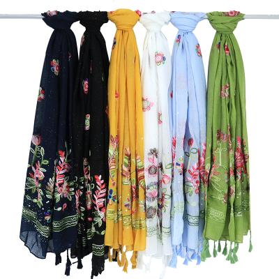 China Cotton On Sale 50% Embroider Cotton Hemp Tassel Floral Printed Muslim Hijab Shawls for sale