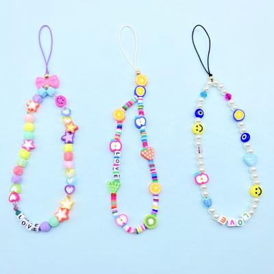 China Amazon Cute Various Shapes Cute Hot Selling Acrylic Mobile Phone Charm Clips Good Luck Phone Chain For Girls for sale