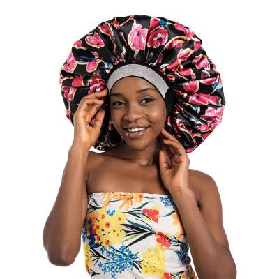 China Bling Picture African Print Stretch Diamond Oversized Diamond Wide Brim Sleep Cap Imitation Silk Round Hat For Curly Hair for sale