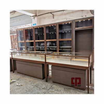 China Jade Jewelry Kiosk Stainless Steel Showcase Wood Grain Laminate Customization Display High End Cabinet Back Against Wall Customize for sale