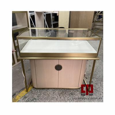 China Fashionable high-end Chinese jewelry display cabinet new counter brushed stainless steel jewelry display cabinet customization for sale