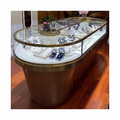 China Premium Oval Stainless Steel Jewelry Display Glass Case Jewelry Watch Store Showcase Manufacturer Customize for sale