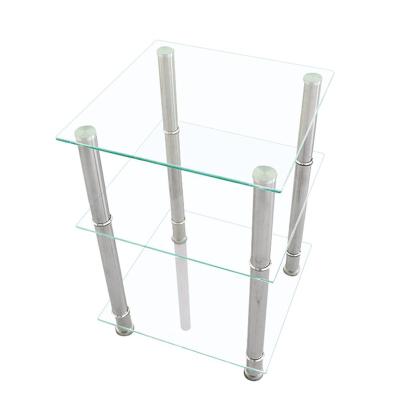 China Designer Clear Round Transparent Gold Glass Coffee Table Simple Durable Comfortable Modern Silver Steel Legs for sale