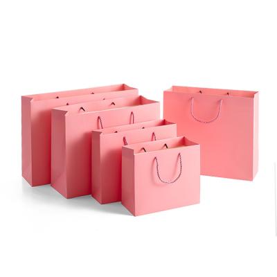 China Wholesale Recyclable Custom Logo Gift Eco Friendly Recycling Pink Paper Bag Small With Handle for sale