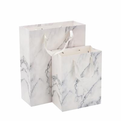 China Recyclable Apparel Packaging Shopping Bags White Marble Pattern Logo Printing Luxury Gift Paper Bag With Handle for sale