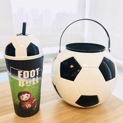 China Sustainable Hot Selling Reusable Plastic Souvenir Tumbler With Lids 2022 Soccer Ball Word Cup Soccer Water Bottle With Storage for sale