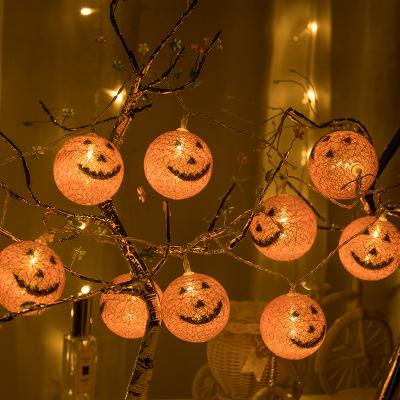 China Holiday Decorations Wholesale Decorative LED Battery Box Lamp String Funny Face Cotton Yarn Ball Halloween Lamp String for sale