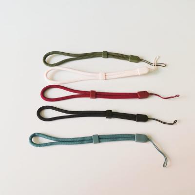 China Wholesale Promotional Eco-friendly Adjustable Cheap Round Rope Lanyard Wrist Strap Short Phone Case Polyester for sale