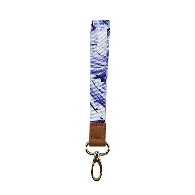 China Wholesale High Quality Eco-Friendly Sublimation Leather Custom Wrist Lanyard Short Key Chain Bracelet Ties Bulk For Cell Phone Cases Keys for sale