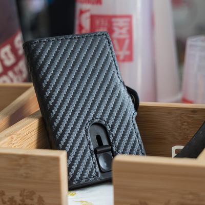 China RFID blocking protects 2021 business metallic casekey RFID blocking ID wallet men card holder money leather clip for sale