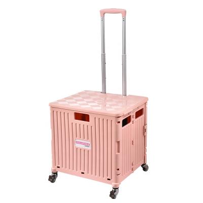 China 2021 Factory Direct Large Capacity 4 Wheels Portable Supermaket Easy Folding Plastic Pink Folding Shopping Cart With Lid for sale