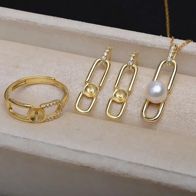 China Real CLASSIC 135S 6-8mm 925 Sterling Silver Natural Freshwater Pearl With Gold Plated Earring Dangle Ring Set Style For Gift for sale