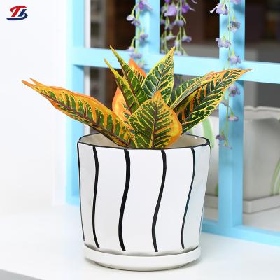 China Simple Minimalist NNordic Table Top Creative Flowerpot Small Ceramic Plant Pot for sale