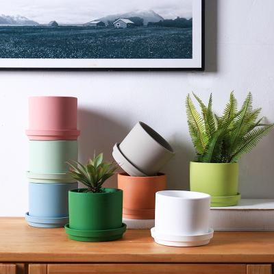 China Indoor Pure Color Small Ceramic Flower Style Flower Pot Contemporary Cheap Ceramic Flower Pot Small Pot OEM Contracted for sale