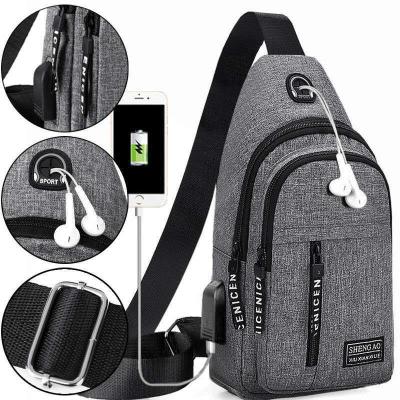 China Fashionable Multifunctional Large Capacity Waterproof Men's Business Trunk Bag Walking Earphone Casual Messenger Bag With USB Charging for sale