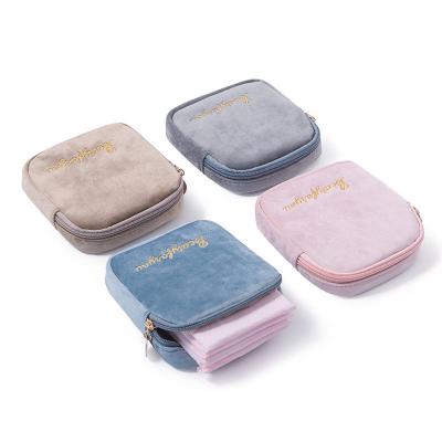 China cute heart multifunctional snitary portable flannel snitary storage bag girl fashion use bag aunt sanitary napkin towel storage bag small for sale