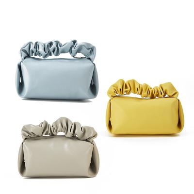 China New 2022 fashion ins color cloud bag pure portable single pvc leather fold female cosmetic bag for sale