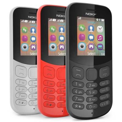 China Dual SIM Card Unlocked Gsm 130 2G GSM Feature Loud Speakerphone Button Cell Phone Cheap Custom Cell Phone for sale