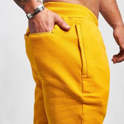 China Custom Gym Anti-Pilling Cotton Pockets Jogger Logo Jogger Sweatpants Pants For Men for sale