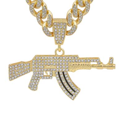 China Hiphop 14K Gold Plated Cool Ice Out AK47 Rifle Pendant Does Not Fade Hip Hop Jewelry for sale