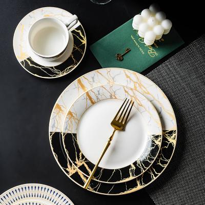 China Viable Western English Porcelain Style Luxury White Marble Black Marble Ceramic Dinnerware Set With Gold for sale