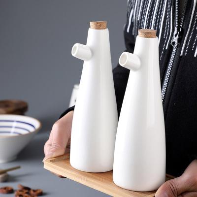 China Japanese Style Kitchen Paraffin Oil Matte Dispenser Oil Vinegar Stored Ceramic Bottle With Cork for sale