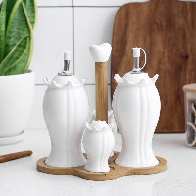 China Stocked Wholesale Ceramic Oil Vinegar Bottle Kitchenware Salt And Pepper Shakers Oil Dispenser for sale