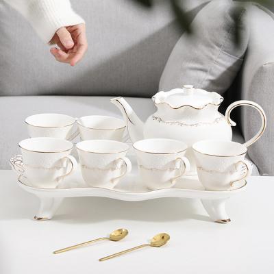 China Viable Modern Style Luxury Floral Tea Cup Set Gold White English Ceramic Coffee Tea Set For Afternoon Tea Time for sale