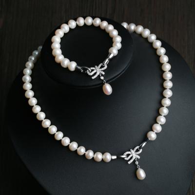 China 2021 Lead Free Shipping Nickel Free Crystal Bow Natural Pearl Necklace Jewelry Weddings Set 10mm Freshwater Pearl Necklace Set For Women for sale