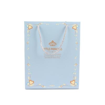 China Recyclable Custom Logo Small Princess Clothing Gift Paper Bag With Handle for sale