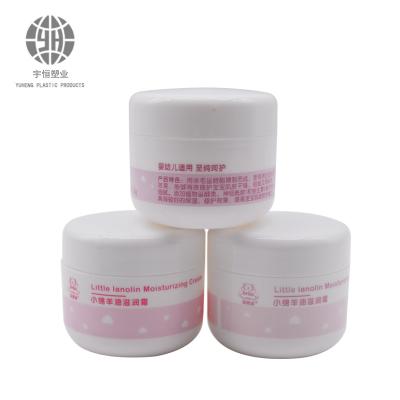 China Food grade 30ml volume cream jars popular food grade round shape pp plastic packaging with same material cap for cosmetic cream 54*48mm for sale