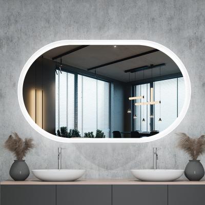 China US Modern Glass Stock Led Makeup Mirror Hanging Wall Oval Touch Mirror Bathroom Waterproof Dressing Smart Led Dressing Mirror for sale