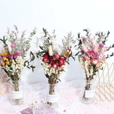 China Yuntu Touch Gift Decoration Home Valentine's Day Long Last Dry Mix Flowers Bouquets Natural Rose Wedding Natural Flower Bouquet For for sale