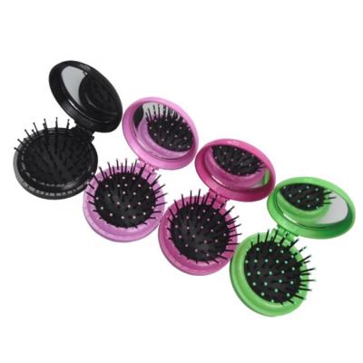 China Promotional Gift 7 Color Travel Collapsible Stock Hair Comb Plastic Air Cushion Comb for sale