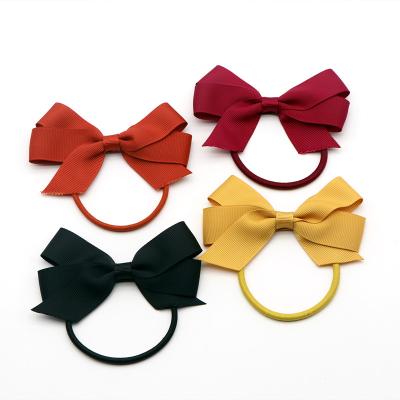 China Fashion Clear Women Hair Tie Hair Tie For Women Plastic Bow Hair Band for sale