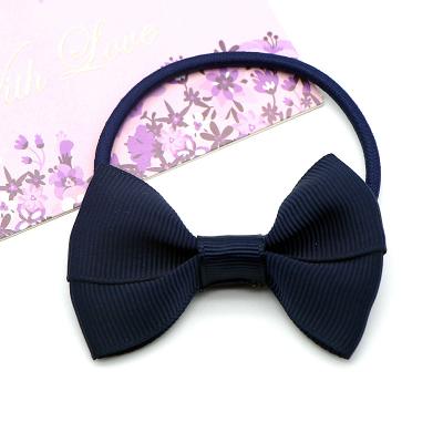 China Clear Fashion Women Hair Tie Hair Tie For Women Plastic Bow Hair Tie for sale