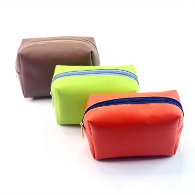 China Fashion new design PU solid color leather simple cosmetic bag color and LOGO can be customized for sale