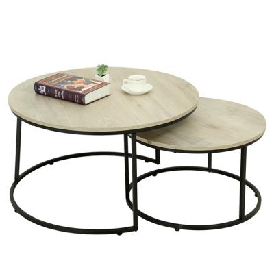 China Rustic finish industrial circular set with two coffee tables with wooden top and metal base en venta