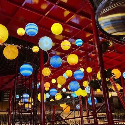 China Modern App Controlled Solar Hanging Rotating Garden Light LED Ball Rotating Floating for sale