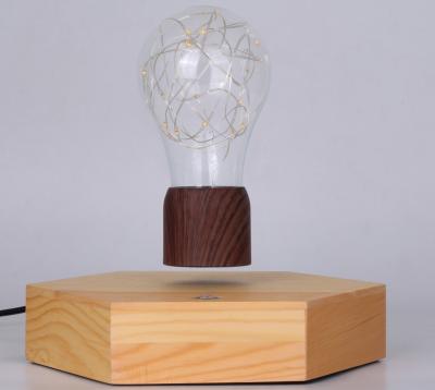 China 360 magnetic levitation display for lamp , floating lamp light bulb display with wooden base for sale