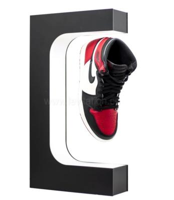 China E shape magnetic levitation floating pop sneaker shoes display stands for sale