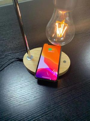 China new 360 rotating magnetic levitation floating lamp light bulb with wireless charger for iphone for sale